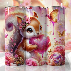 May include: A pink and white stainless steel tumbler with a cute cartoon squirrel holding a pink heart. The background features pink flowers, butterflies, and hearts.