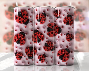 Könnte beinhalten: Drei Edelstahlbecher mit rosa Hintergrund und einem Muster aus roten Marienkäfern mit schwarzen Punkten und Herzen.