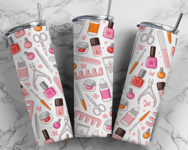 May include: Three stainless steel tumblers with a white background and a repeating pattern of nail polish bottles, nail clippers, nail files, and other manicure tools.