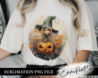 May include: A white t-shirt featuring a sublimation print of a witch with a green hat holding a jack-o'-lantern. The witch has long blonde hair and blue eyes. The background is a watercolour style with autumn leaves.