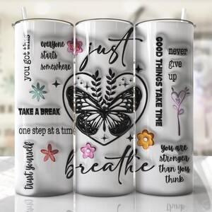 May include: Three white tumblers with inspirational quotes and a butterfly design. The quotes are "You got this", "Just Breathe", and "Good things take time".