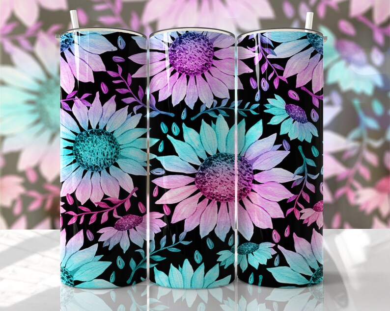 May include: Three stainless steel tumblers with a black background and a repeating pattern of watercolor-style pink, blue, and purple sunflowers with green leaves.