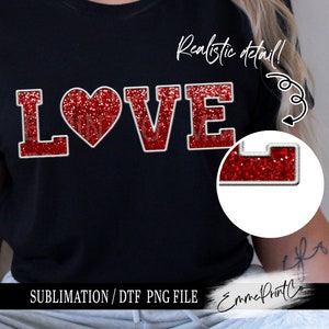 May include: Red glitter iron-on letters spelling "LOVE" with a red glitter heart in the center. The letters have a white outline. The image shows a close-up of the letters on a black t-shirt.  SUBLIMATION/ DTF PNG FILE.  EmmePrintCo.