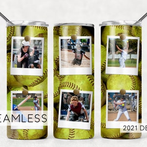 May include: A stainless steel tumbler with a seamless design featuring a pattern of yellow softball images. The tumbler has a straw and includes photos of young people playing softball. The text "SEAMLESS" and "2021 DESIGN" are printed on the tumbler.