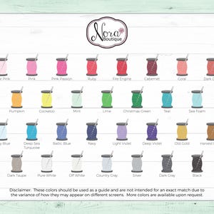 May include: A chart of 24 different thread colors, displayed in spools, with the color name written below each spool. The colors include light pink, pink, pink passion, ruby, fire engine, cabernet, coral, dark coral, pumpkin, cockatoo, mint, lime, Christmas green, teal, sea foam, baby blue, deep sea turquoise, Baltic blue, navy, light violet, deep violet, old gold, harvest brown, dark taupe, pure white, off white, country gray, silver, dark gray, and black.