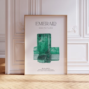 May include: A poster with a green emerald crystal illustration. The poster has the text "EMERALD" and "ΣΜΑΡΑΓΔΟΣ" in black text. The text "Be Al2SiO3" is also included.