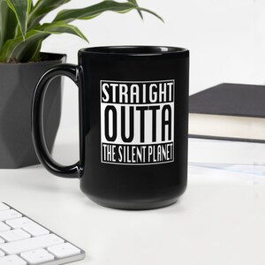 May include: Black ceramic mug with a white graphic that says "STRAIGHT OUTTA THE SILENT PLANET".