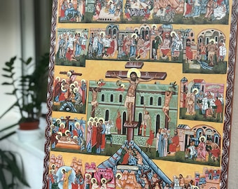 May include: A colorful, hand-painted icon depicting the Stations of the Cross. The icon features a detailed depiction of Jesus' journey to the crucifixion, with scenes of his arrest, trial, and carrying of the cross. The icon is framed in a dark brown wood frame.