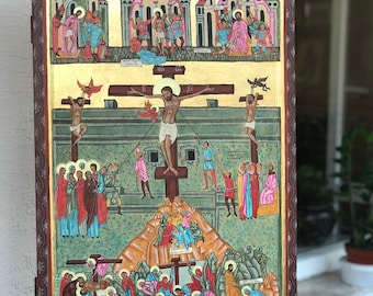 May include: A hand-painted icon depicting the crucifixion of Jesus Christ. The icon features a detailed depiction of the crucifixion scene, with Jesus on the cross, surrounded by figures of soldiers, mourners, and other individuals. The icon is painted in a traditional style, with vibrant colors and intricate details.