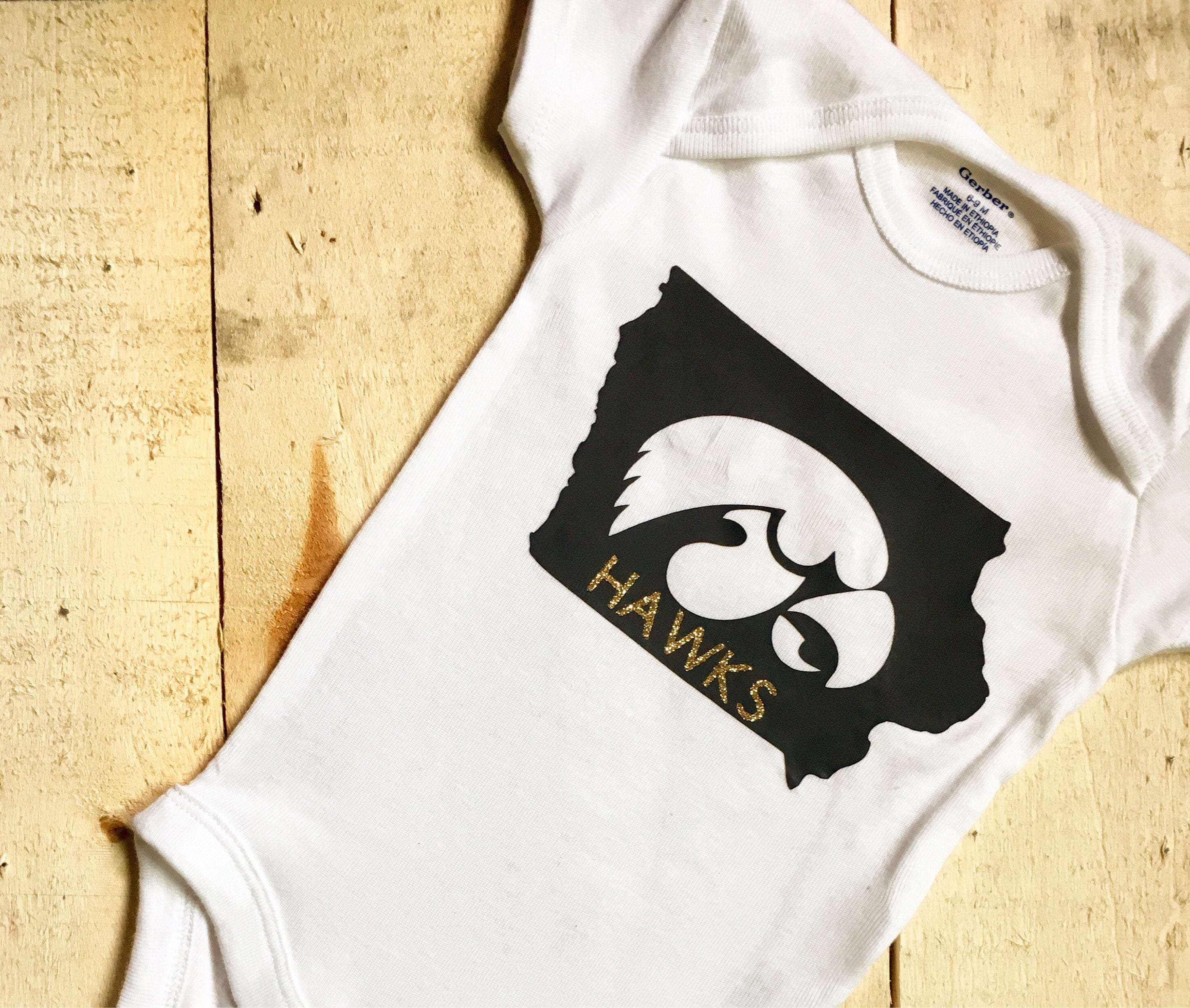 hawkeye onesie
