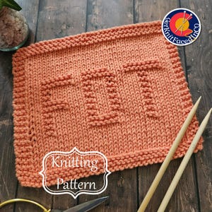 May include: A knitted dishcloth with a "Knitting Pattern" label. The dishcloth is a peach color and features a knitted design of the letter "F" in the center.