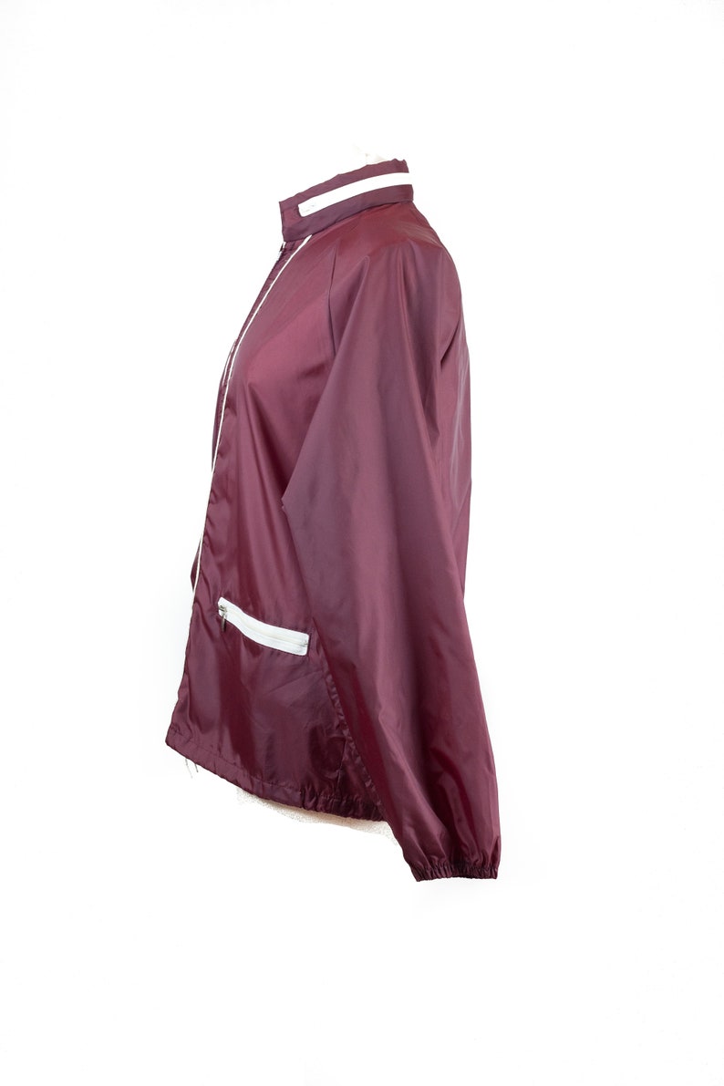 windbreaker with hidden hood