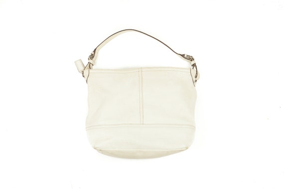 white leather coach purse
