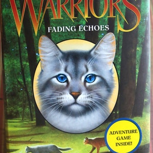 May include: A book cover for "Warriors: Fading Echoes" by Erin Hunter. The cover features a cat with blue eyes in a yellow circle, set against a forest backdrop. The title is in large, orange letters. A yellow sticker says "Adventure Game Inside!"