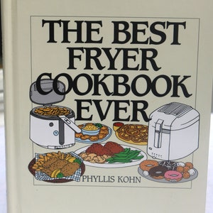 May include: A cookbook titled "THE BEST FRYER COOKBOOK EVER" with illustrations of fried foods and fryers. The cover is off-white with black text and illustrations. The author's name, Phyllis Kohn, is at the bottom.