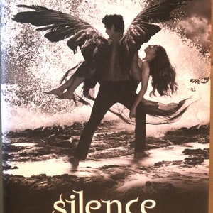 May include: Book cover featuring a black and white image of a man with wings carrying a woman in a flowing dress. The title "silence" is in a stylized font with the words "hush, hush saga" in smaller font below. The author's name "Becca Fitzpatrick" is at the bottom of the cover.