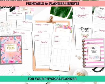 May include: A collection of printable planner inserts featuring floral designs and various sections for planning, including a monthly calendar, weekly planner, and prayer plans. The inserts are designed for use with A5 size planners.