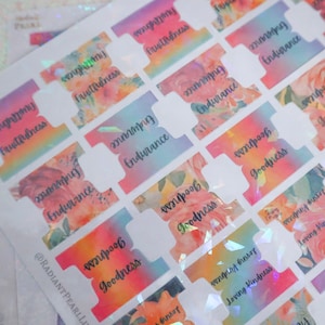 May include: A sheet of colorful floral patterned stickers with words like "Fruitfulness", "Endurance", "Goodness", and "Loving Kindness".