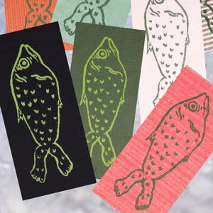 Various colours of patches on ice (like at a fish market.)