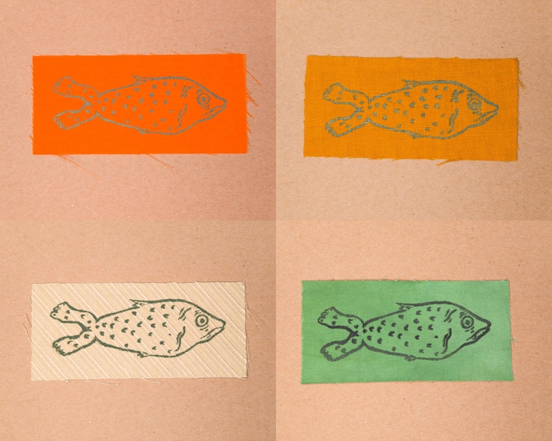Fish patches in the colours Orange, Gold, Tea Green, and Green.