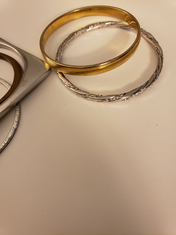 Five bangle bracelets - image 1