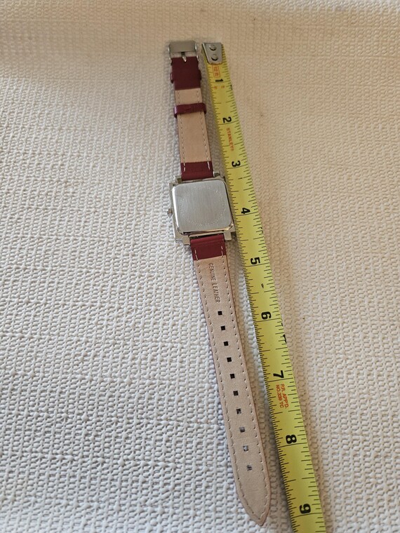 ladies red watch with handwritten numbers - image 5