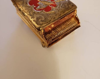 Red and gold piano trinket box