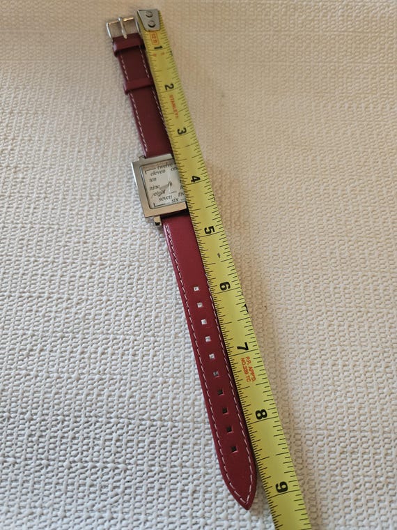 ladies red watch with handwritten numbers - image 4