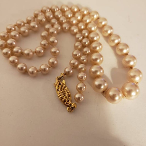 G. Silver pearl necklace