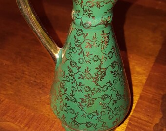 Porcelain hand painted 22k Guaranteed Gold Vase or pitcher