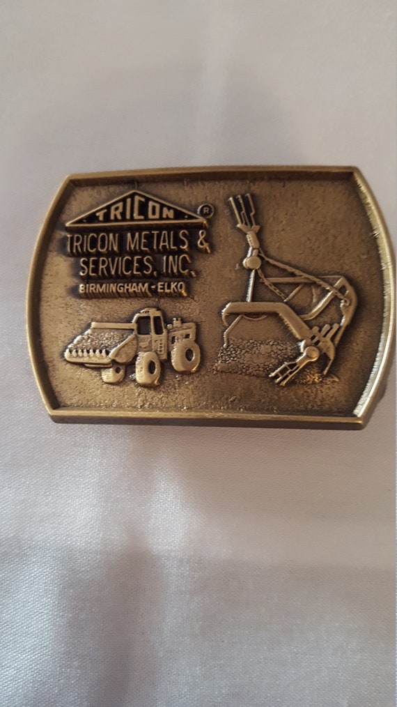 Solid brass Tricon metals and services belt buckle