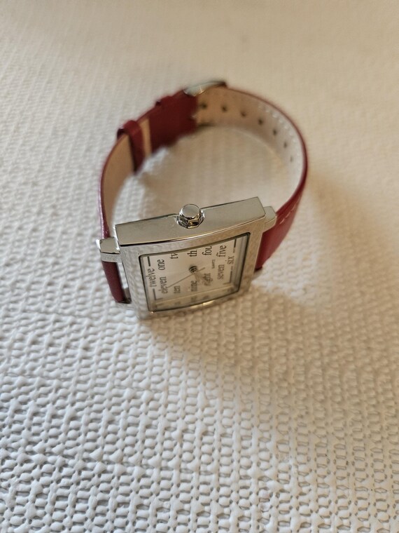 ladies red watch with handwritten numbers - image 9
