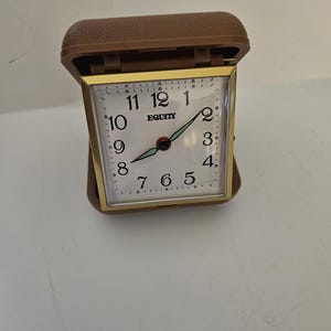 Equity travel alarm clock