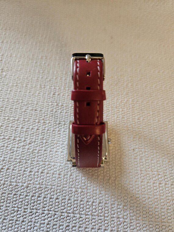 ladies red watch with handwritten numbers - image 8