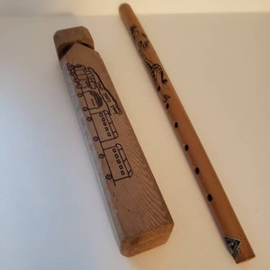 A pair of wood musical instruments