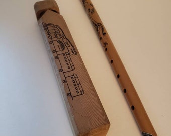 A pair of wood musical instruments