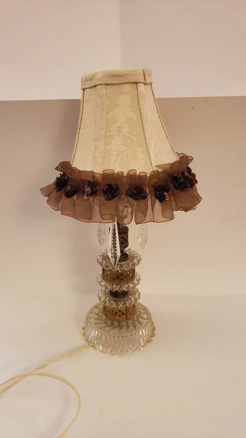 Vintage crystal shops night lamp ith ornate brass and shade