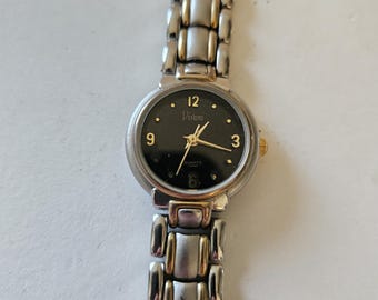Ladies Vivani Stylish Round Silver Tone green leather band Analog Watch