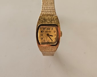 Ladies Bulova wind up bracelet watch 10k gold overlay
