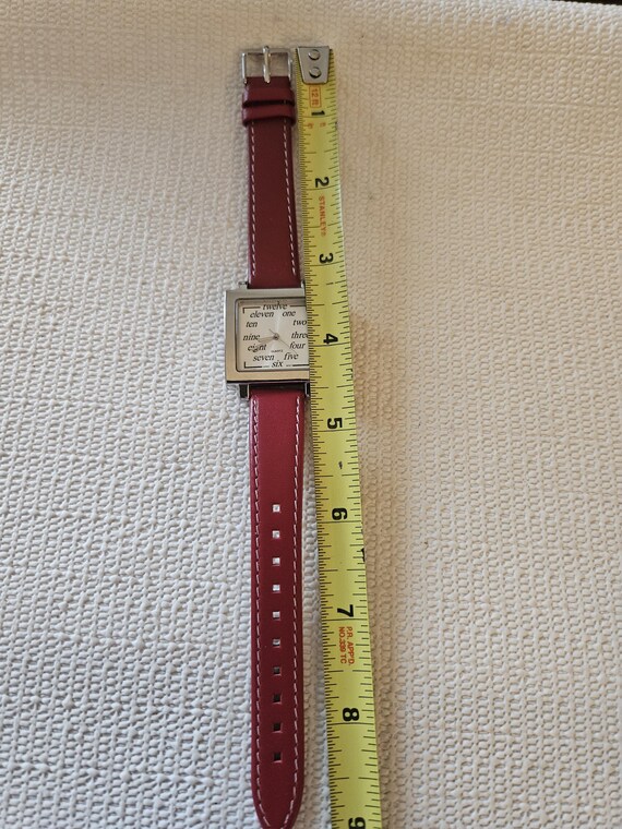 ladies red watch with handwritten numbers - image 7