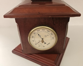 Bombay clock and rotating weather station
