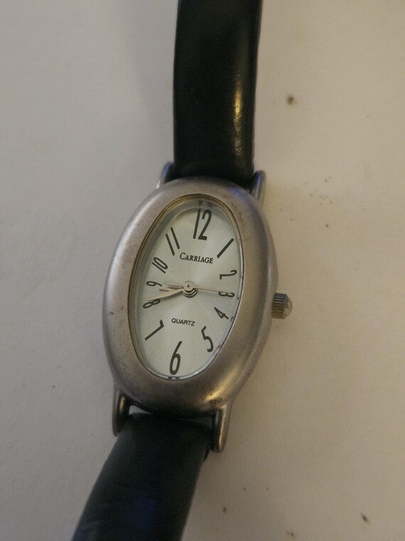 Carriage watch by Timex