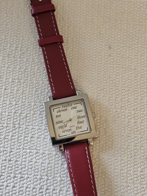 ladies red watch with handwritten numbers - image 2