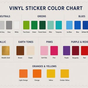 May include: A vinyl sticker color chart featuring rows of colored squares organized by category including neutrals, greens, blues, metallic, earth tones, pinks, purples, reds, oranges, and yellows, with each color labeled by its specific name.