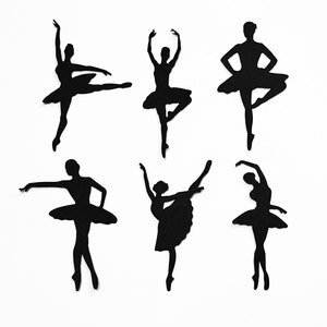 May include: Six black paper cutouts of ballerinas in various poses. Each cutout is wearing a tutu and has a simple silhouette.