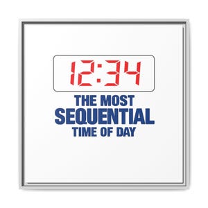 May include: A square framed wall art piece with a white background. It features a digital clock display showing the red numbers 12:34 inside a black-outlined rectangle. Below this, the blue text reads THE MOST SEQUENTIAL TIME OF DAY.