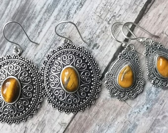 Earrings from Tiger eye in a silver frame