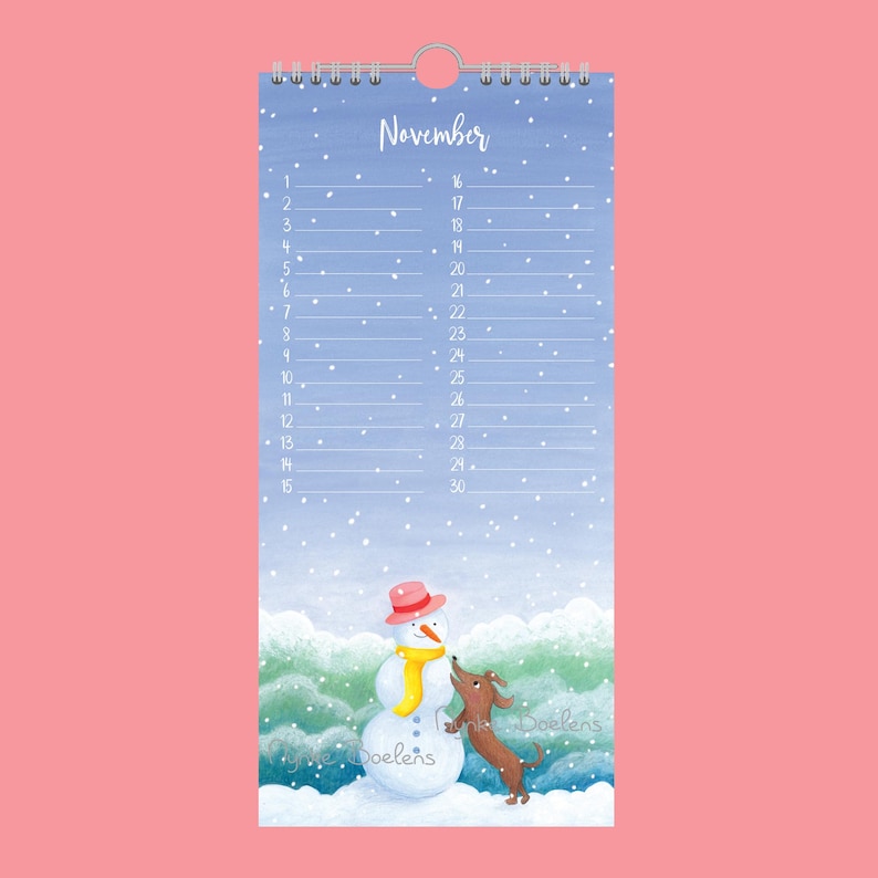 May include: A November calendar with a charming illustration of a snowman and a dachshund. The snowman wears a pink hat and yellow scarf. The calendar has a spiral binding and is set against a snowy, wintery backdrop.