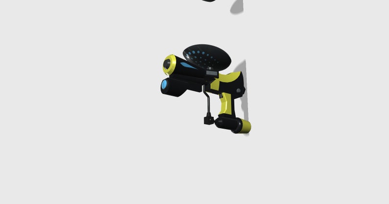 May include: A black and yellow toy gun with a blue and black disc on top. The gun has a black barrel and a yellow handle.