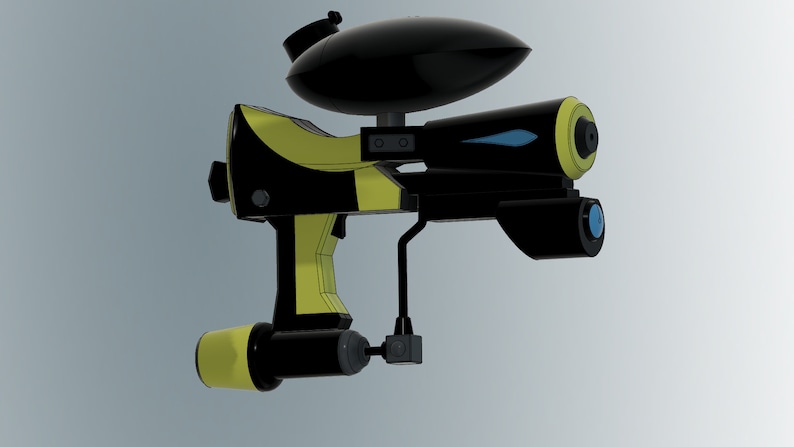 Puede incluir: Una pistola de paintball negra y amarilla con un dep&oacute;sito negro en la parte superior. La pistola tiene un ca&ntilde;&oacute;n azul y una empu&ntilde;adura negra y amarilla.